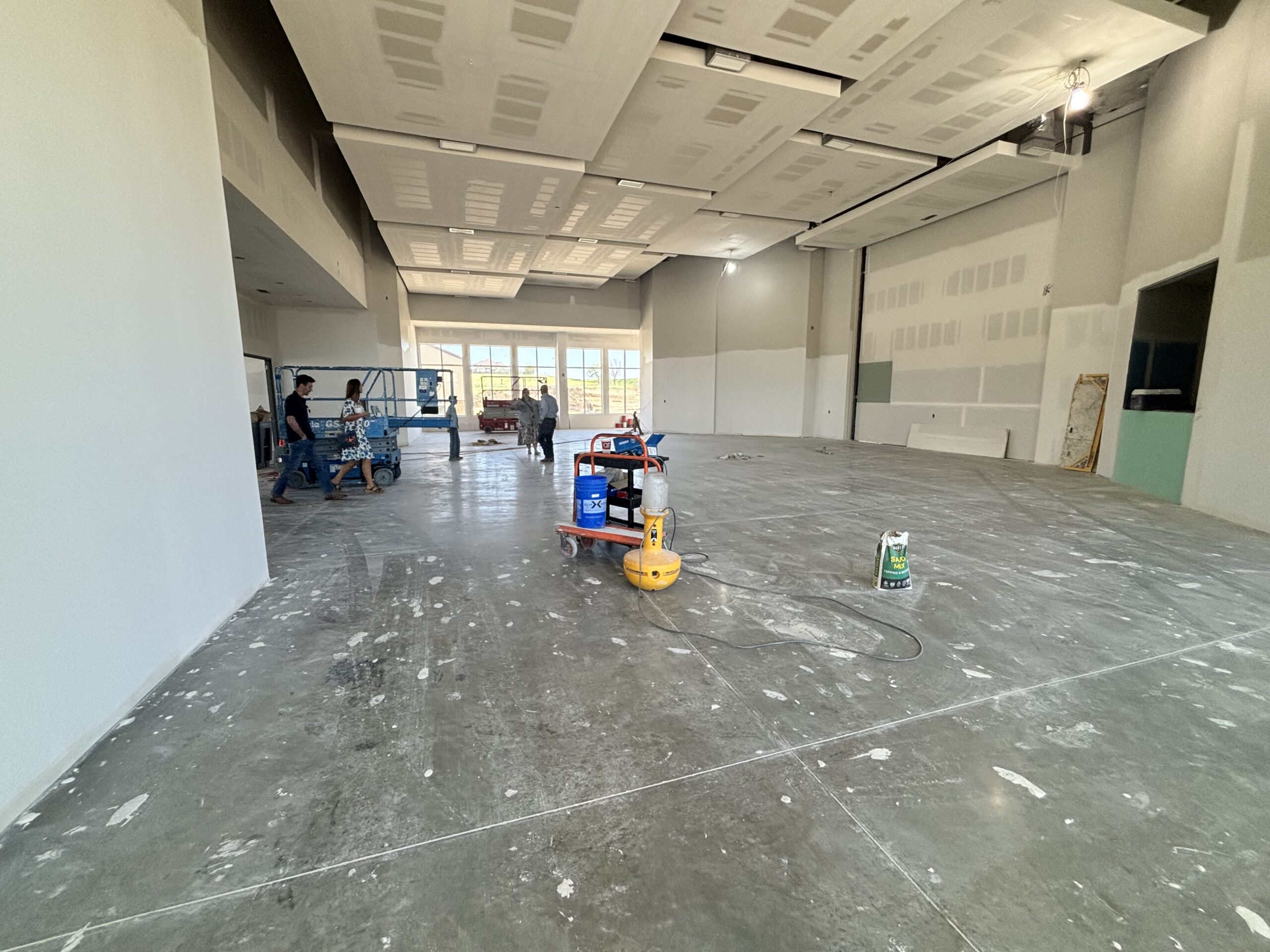 Interior of new worship building showing drywall and ceiling work