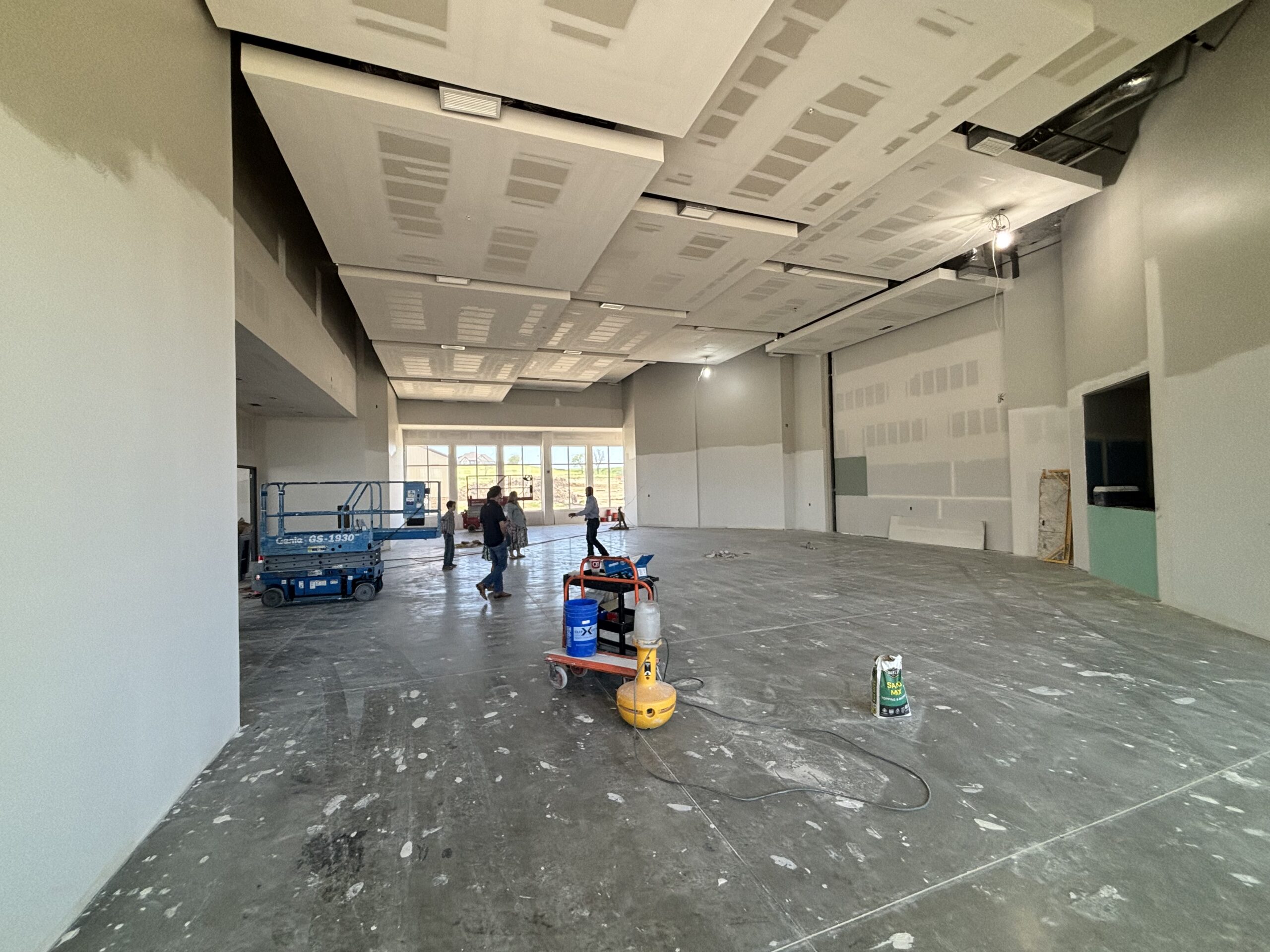 Wide view of worship space interior under construction