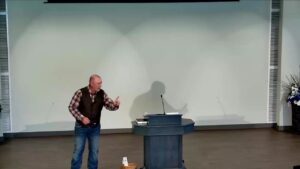 Speaker preaching from 1 Kings 19 at Valley Church of Christ