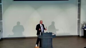 Speaker preaching on next steps for new Christians at Valley Church of Christ